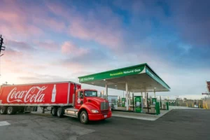 Coca Cola truck parked at a Clean Energy fueling station