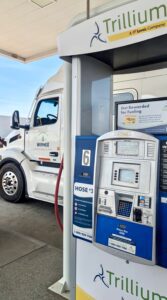 Werner natural gas truck fueling with RNG at a Trillium station.