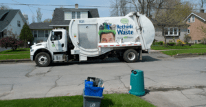 White RNG powered refuse truck.